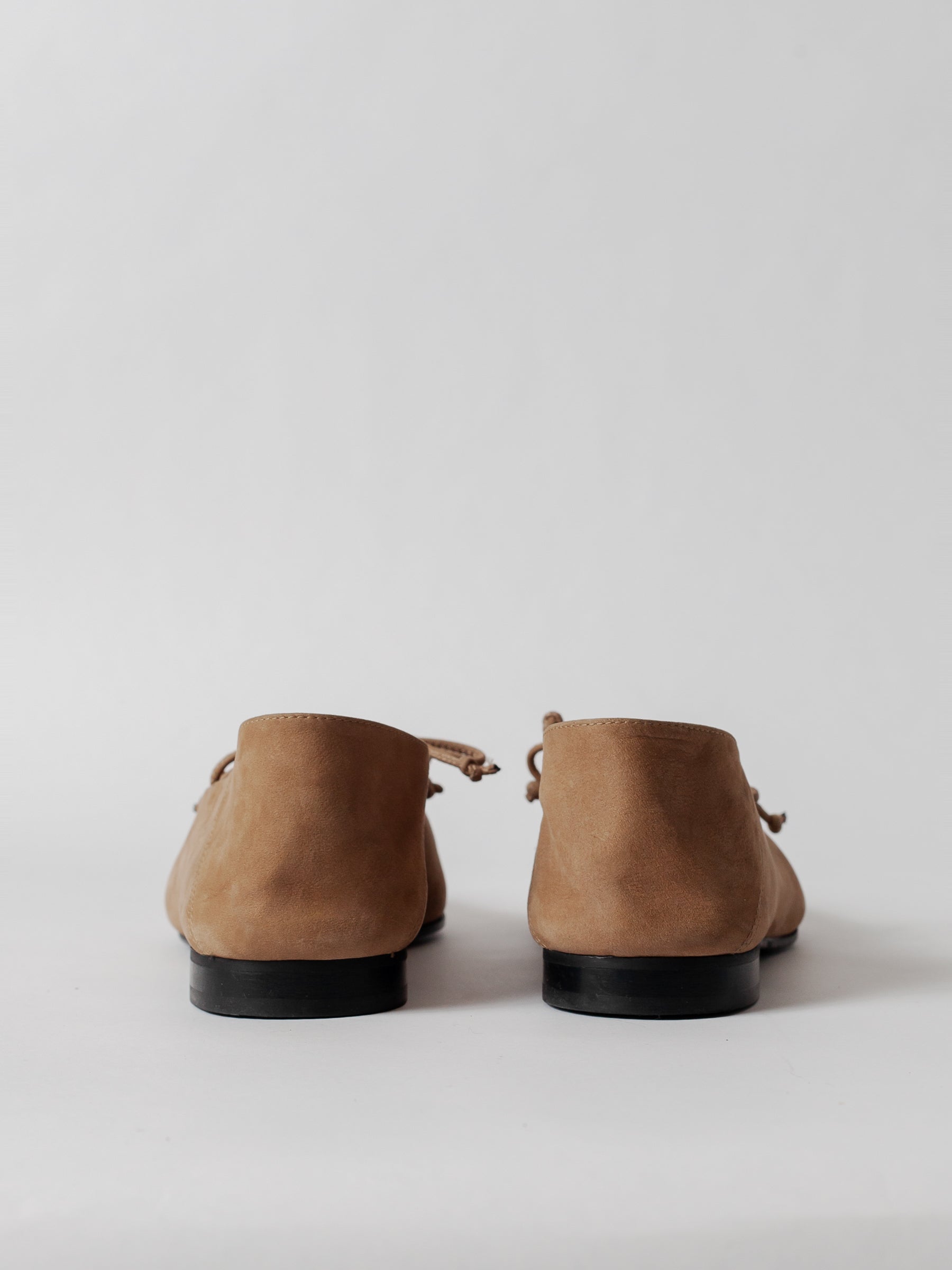 Blankens The Amie - Pair of brown suede shoes on a light gray background
