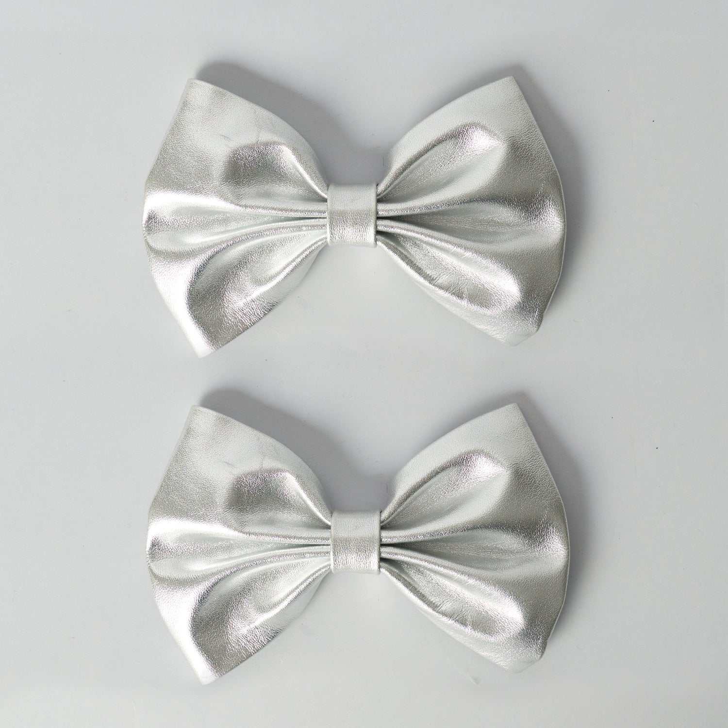 Blankens Silver Bow Clip-ons